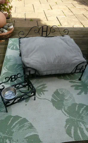 Handmade wrought iron dog bed and feeder